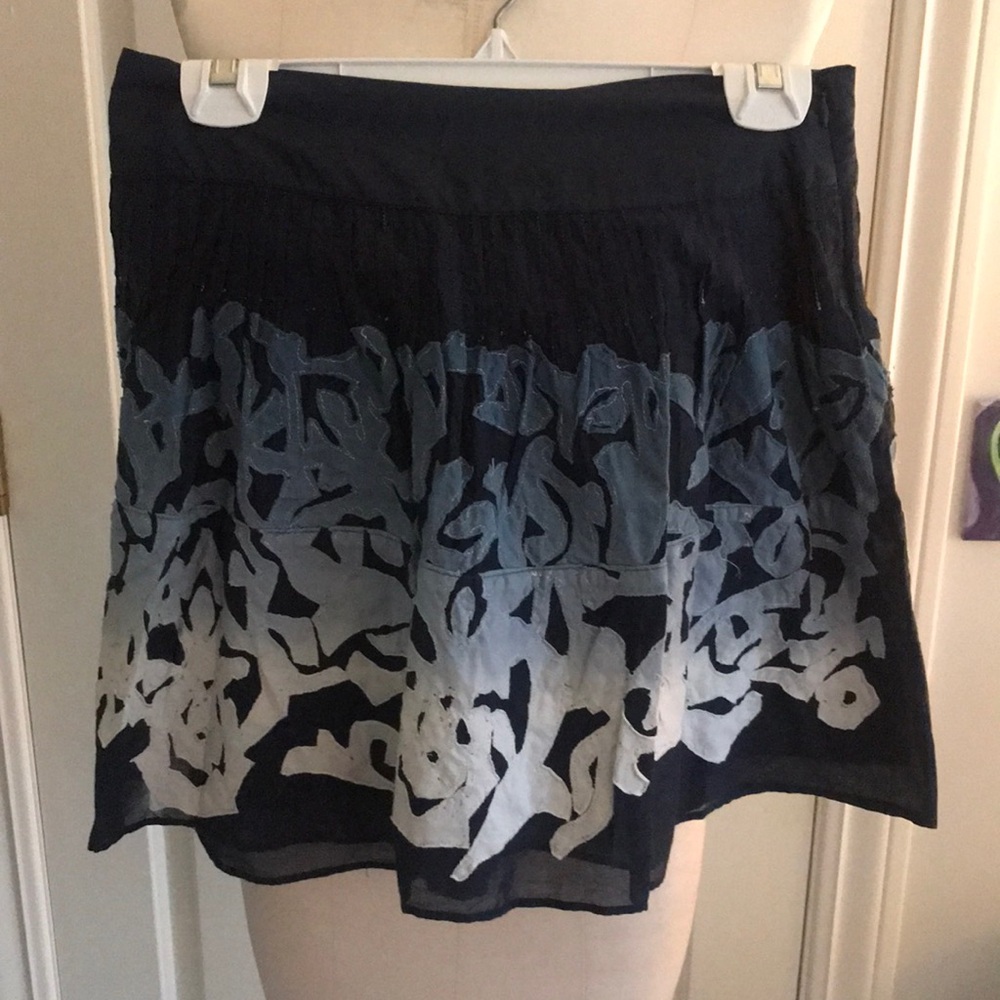 Super cute blue and cream skirt.